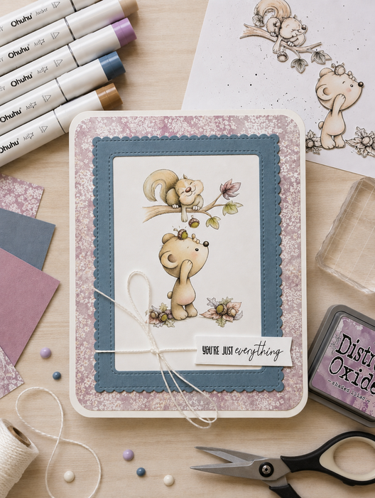 Squirrel and Bear Acorns pre-coloured clipart featuring a cute watercolour woodland squirrel sitting on a tree branch dropping acorns to a little bear, surrounded by Fall leaves and acorns. Hello Autumn printable clipart for card making, scrapbooking, junk journaling and paper crafts.