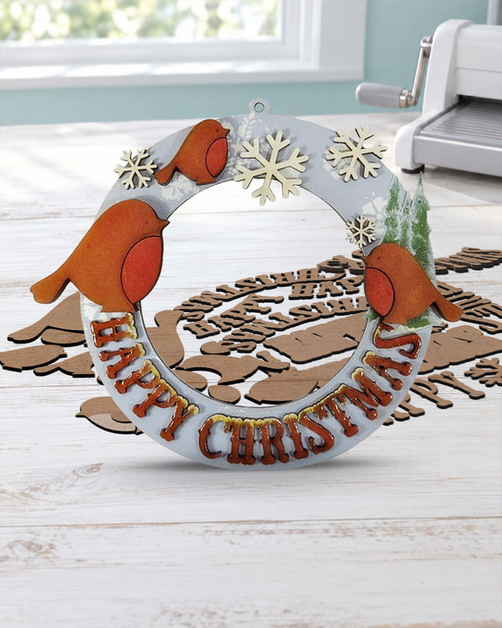 Happy Christmas birds MDF wood craft blanks kit - for card making and crafts, mixed media crafting, junk journaling, planner crafts, scrapbooking, home decor crafting, craft fair sellers.

Includes 32 pieces, 3mm MDF:
Wreath measures approx 22cm
largest bird approx 13cm tall.

This lovely Christmas themed MDF kit is perfect for decorating however you wish.

Use paints, inks or papers and texture pastes to cover the base wreath and circle then layer up with the decorative words and cut birds to make a festice sign or decorative plaque that's useful in so many ways around the home.

3mm MDF.