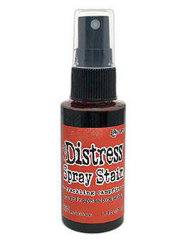 Crackling Campfire  Distress Stain Spray ink - Tim Holtz.  Spray directly on porous surfaces for quick, easy ink coverage. Mist with water to blend color and create mottled effects. Spray through stencils, layer colors, spritz with water and watch the color mix & blend. Spray Stains coordinate with the Distress palette of products.