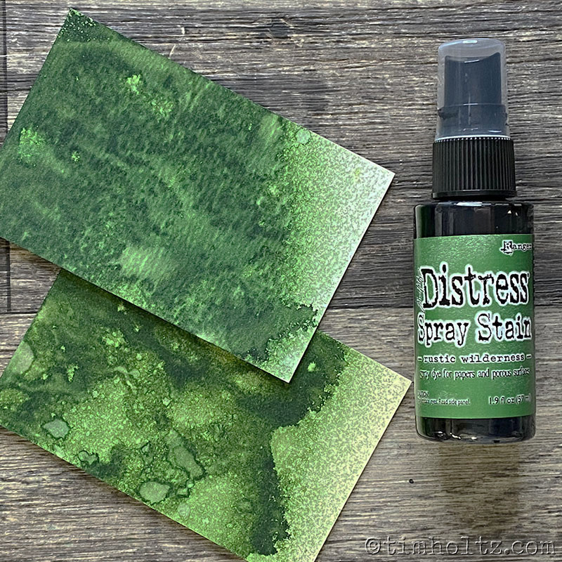 Rustic Wilderness Distress Stain Spray ink - Tim Holtz.  Spray directly on porous surfaces for quick, easy ink coverage. Mist with water to blend color and create mottled effects. Spray through stencils, layer colors, spritz with water and watch the color mix & blend. Spray Stains coordinate with the Distress palette of products.