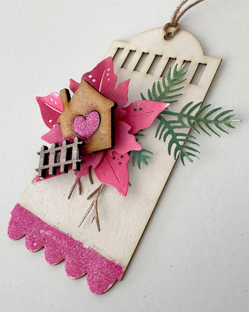 MDF houses embellishments pack - Wood Blank Craft Kit, Home Décor with painted pink leaves, green foliage, and a glittery heart on a small house, designed for DIY home decoration projects.