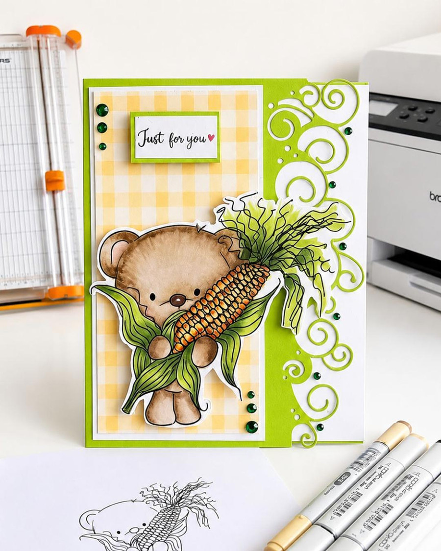 Bear Sweetcorn Harvest black and white digital stamp with a cute woodland teddy bear holding a giant corn on the cob, from the Hello Autumn collection. Fall and Autumn printable craft image for card making, scrapbooking, junk journals and paper crafts.