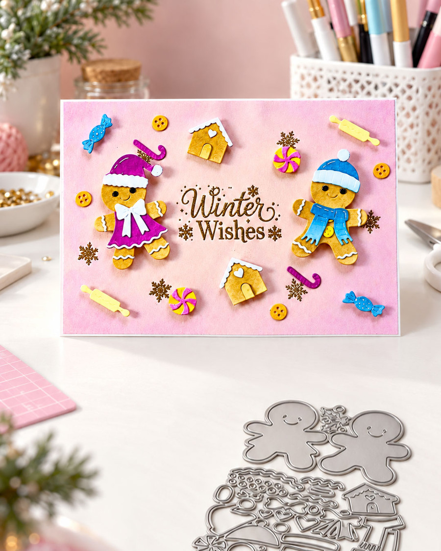 Oh Snap Gingerbread craft dies- cutting dies for card making and crafts, junk journaling, planner crafts, scrapbooking.

Who doesn't love gingerbread at Christmas?!

This die set has 2 gingerbread people complete with different hats, scarves, buttons and bows to dress them up! SO adorable! There are intricate dies for the icing decorations, a rolling pin, gingerbread house, candy cane, holly and sweets too - you'll have so much fun with this die set!

The best part is we tried to make all the colour co-ordinated pieces connected together to make your die cutting much faster and easier! It's adorable!