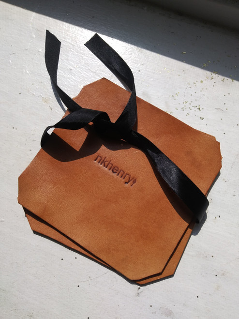 SADDLE /NATURAL TAN LEATHER COASTERS SADDLE /NATURAL TAN LEATHER COASTERS