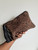 LEOPARD TASSEL CLUTCH