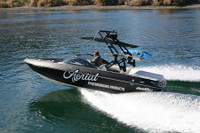 Shown in black, the FreeRide wakeboard tower installed on a boat shows it's the most OEM looking aftermarket tower available.