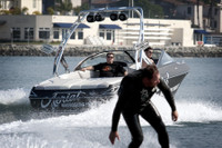 FreeRide wakeboard tower in action at the lake pulling a wakeboarder.