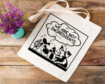 Natural canvas tote bag with a vegan design showing a , chicken, cow and pig. Thought bubble above them with the words we are not ingredients.