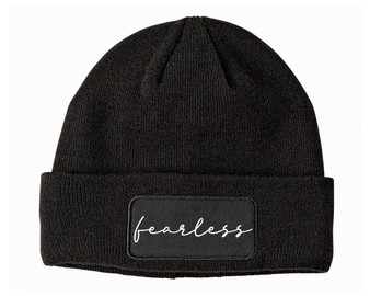 Black winter beanie hat with fearless script in white.