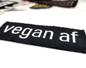 Vegan AF iron on patch in black and white.