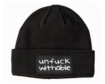 Black patch beanie with unfuckwithable printed on it.