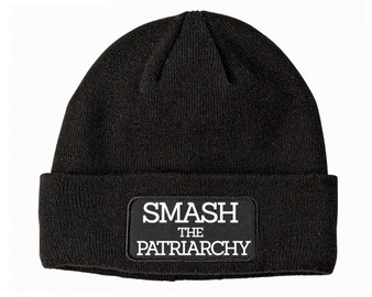 Black patch beanie with smash the patriarchy printed on it.