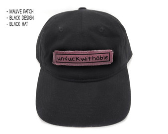 Black dad hat with unfuckwithable patch.