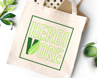 Natural canvas vegan tote bag with two-tone herbivore design.