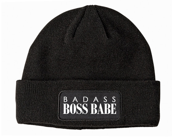 White text Badass Boss Babe on a black winter beanie.