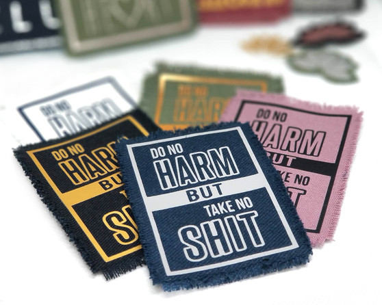 Do no harm but take no shit patches in different colorways.