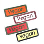 Vegan iron on patches in different colorways.