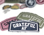 Grateful AF iron on patches in a variety of colorways.
