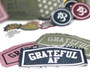 Grateful AF iron on patches in a variety of colorways.