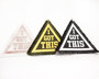 Triangle patches with the motivational words I Got This. Shown in custom color combinations.