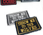 Throw me to the wolves iron on patches in custom colors.