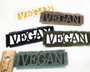 Vegan iron on patches in various color combinations.