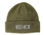 Olive green winter beanie with the words Hustle & Heart on a patch.