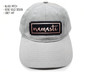 Front view of grey dad hat with namaste patch.