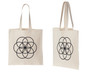 Two views of natural canvas tote bags with black seed of life symbol.