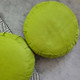 Round green Zafu meditation cushions viewed from above with supportive ergonomic design