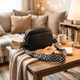 Leather crossbody bag on coffee table in cozy home setting, stylish everyday bag with multi pocket storage