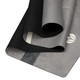 Close-up of layered non-slip yoga mats showing textured grip surface and durability