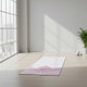 purple flower suede TPE yoga mat for standing yoga practice in a bright home studio