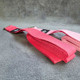 pink yoga stretching belt laid flat on grey surface NEUHAUS ZEN