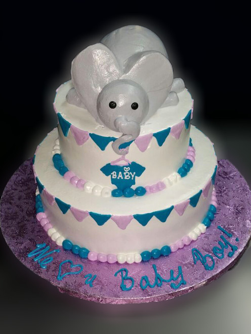 Approximate Servings 30-35. Sizes 8" & 10". Two tiered elephant themed baby shower cake. Elephant is edible.
