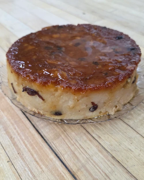 Whole pudín de pan, bread pudding with raisins and a caramel top