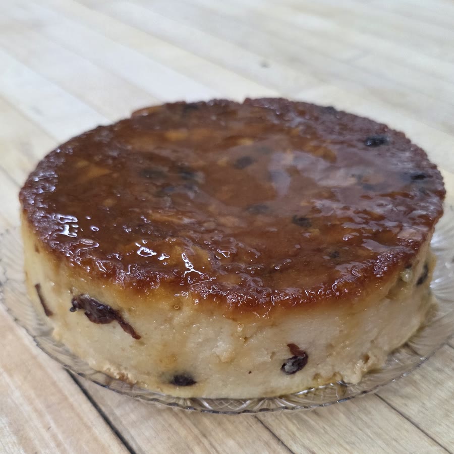Whole bread pudding with raisins and a caramel top