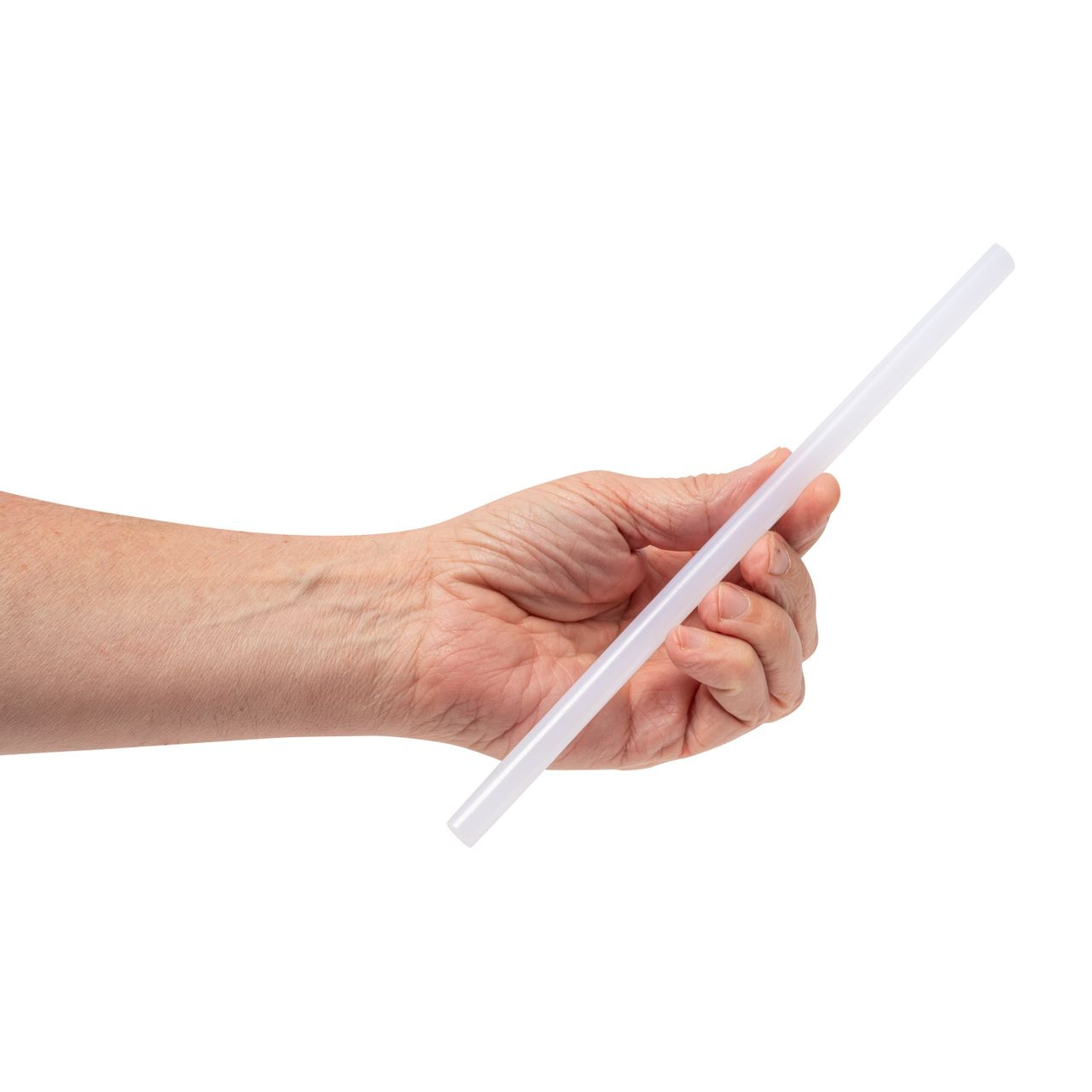 Hand holding a clear Arrow glue stick horizontally against a white background.