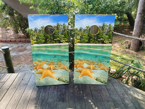 "Starfish Island Beach Cornhole Boards featuring sandy beach with starfish, ocean waves, and tropical island background"