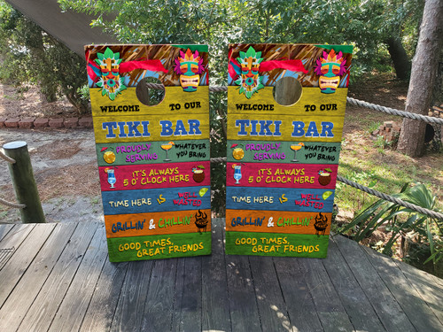Tiki bar-themed cornhole boards featuring tropical island graphics, tiki masks, palm trees, and a beachy vibe, built to professional regulation standards.