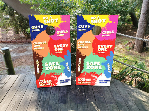 Colorful splatter paint drinking game cornhole boards with bold graphics and drink indicators, built to professional regulation standards.