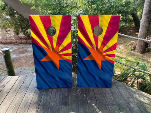 "Waving Arizona Flag Cornhole Boards featuring Arizona state flag design with dynamic waving effect and rustic wood background"