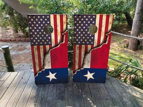 Cornhole boards featuring a distressed texas flag on bottom and a USA flag on the top