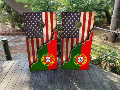 Cornhole boards featuring a distressed USA Flag on top and a Portugal Flag on the bottom