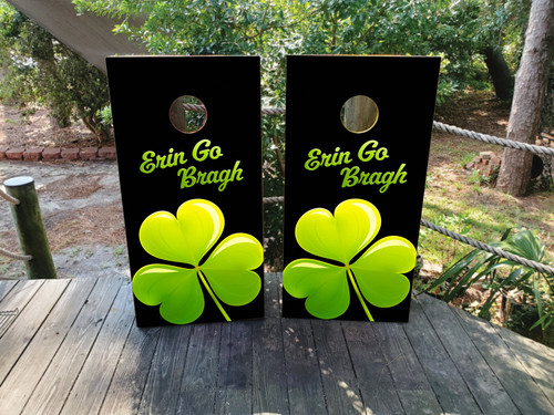 “Regulation 24×48″ tournament-grade cornhole boards featuring Erin Go Bragh Irish flag design with clover emblem over rustic woodgrain wrap, printed on clear-coated ¾″ birch”