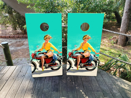 Pin up girl riding a moped