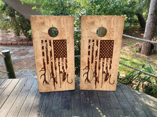 "Dark Wood Grain USA Hunting Cornhole Boards featuring regulation-size birch boards wrapped in rustic wood grain American flag design with hunting silhouettes, clear-coated sides, and reinforced cross braces"