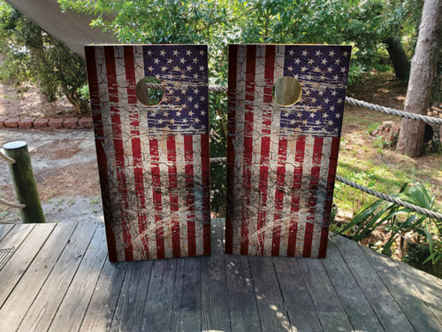Cornhole boards featuring an American USA flag with a scratched texture