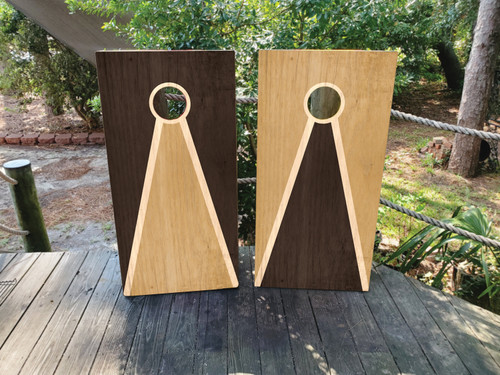 Cornhole boards featuring a natural wood grain design