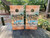 "Life is Better at the Lake Cornhole Boards featuring rustic lake scene with wooden dock, calm water, and relaxing outdoor theme"